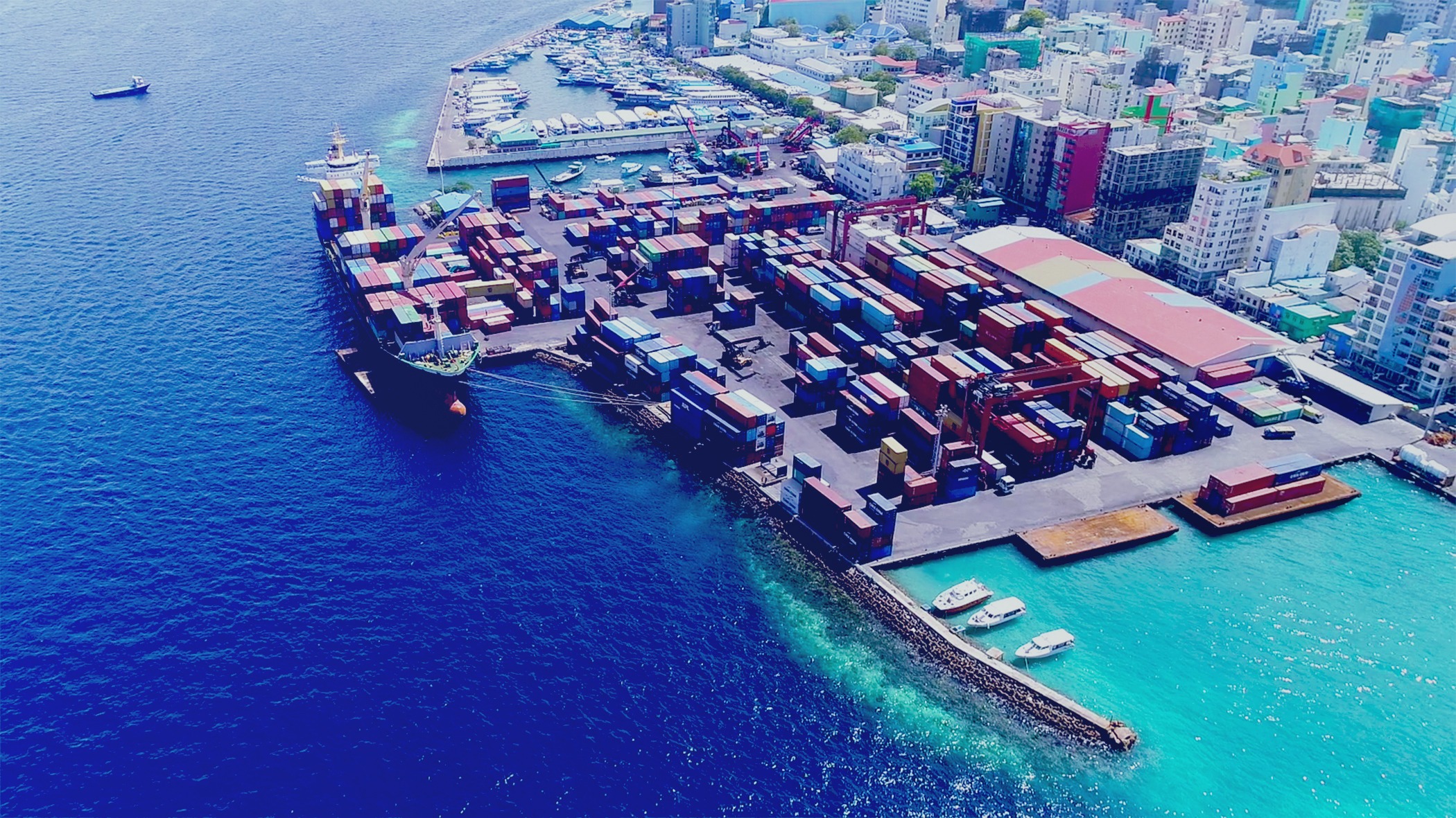 Aerial view of Malé commercial port, containers and harbour